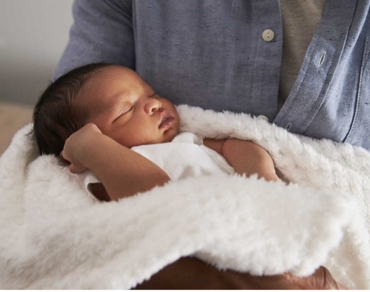 Newborn baby at a Baby Naming Ceremony