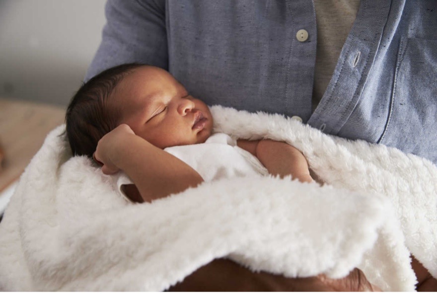 Newborn baby at a Baby Naming Ceremony